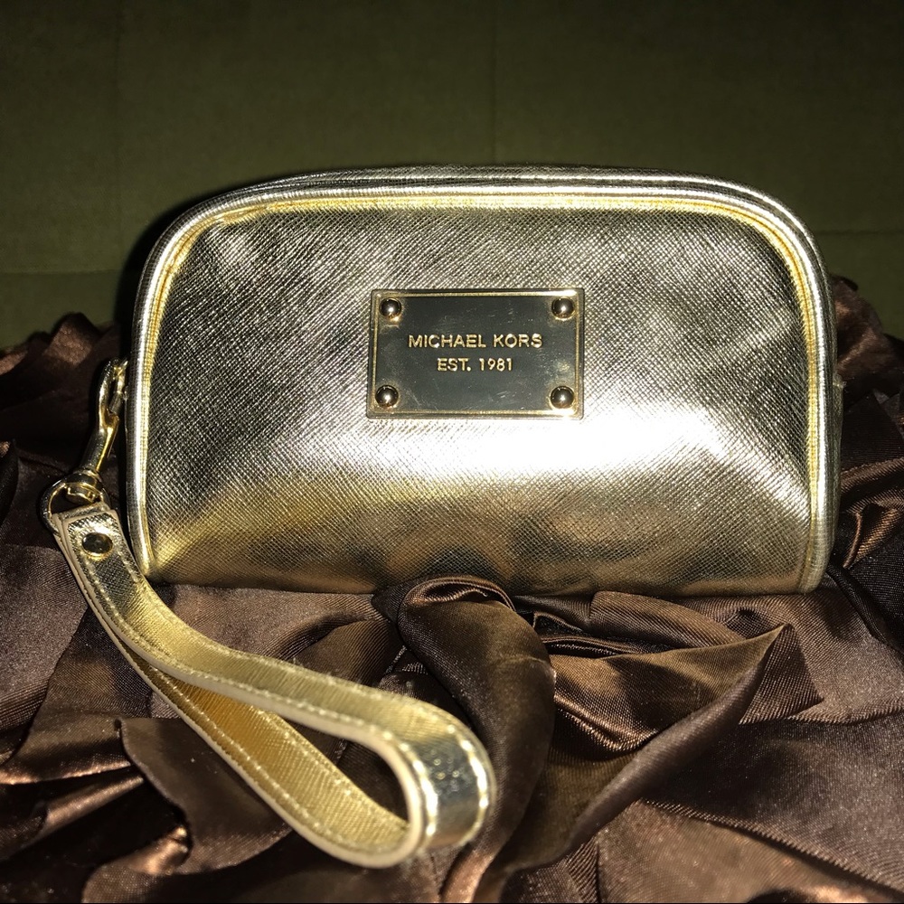 Michael Kors gold wristlet